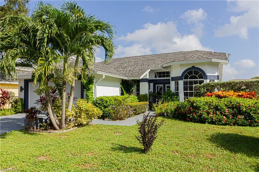 Here's the home you've been waiting for in sought after Berkshire Lakes.  This 2 bed + Den/ 2 bath home features an open floor plan, impact resistant sliders, new front door, Stainless Steel appliances, eat in Window breakfast nook, New interior ceiling fans, new AC (2021), New laminate flooring in main living areas/baths, New carpet in bedrooms and 2 car garage. New Roof and Cage completed in 2018.  You'll be amazed by the fully renovated bathrooms.  Enjoy solitude on your freshly paved lanai with the large resurfaced pool (2018) and covered dining/sitting areas.  The home is perfectly ensconced on a Cul De Sac and close to restaurants, shopping and the beaches of Marco Island and Naples. Don't miss this one.