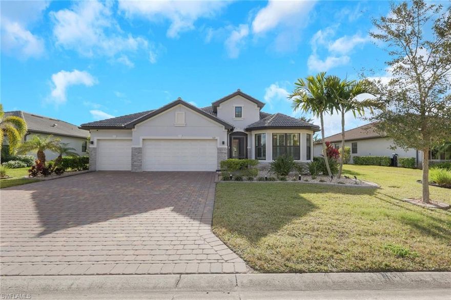 This home is the crown jewel of the Hampton Lakes neighborhood, sitting at the base of a large lake on a fenced oversized lot. The huge 3 car garage is custom with added space for storage. This home has been upgraded with with a large custom built, heated salt water pool and spa. the outdoor bar, dining area, 70" large screen smart TV,(conveys)  LED lights and built in speakers for entertaining makes this property incredibly unique.  Outdoor living area boasts a custom panoramic screen enclosure for maximum views. Gorgeous setting for morning coffee and watching the abundant wildlife at sunset. Tile and luxury vinyl floors in bedrooms and closets. This home features large master bedroom with dual sinks, shower, water closet and very spacious walk in closet.   Take a walk or golf cart ride to the  club house to enjoy the weight room or beach style pool, pickel ball courts, playground and large grass areas to play with your kids or dogs.