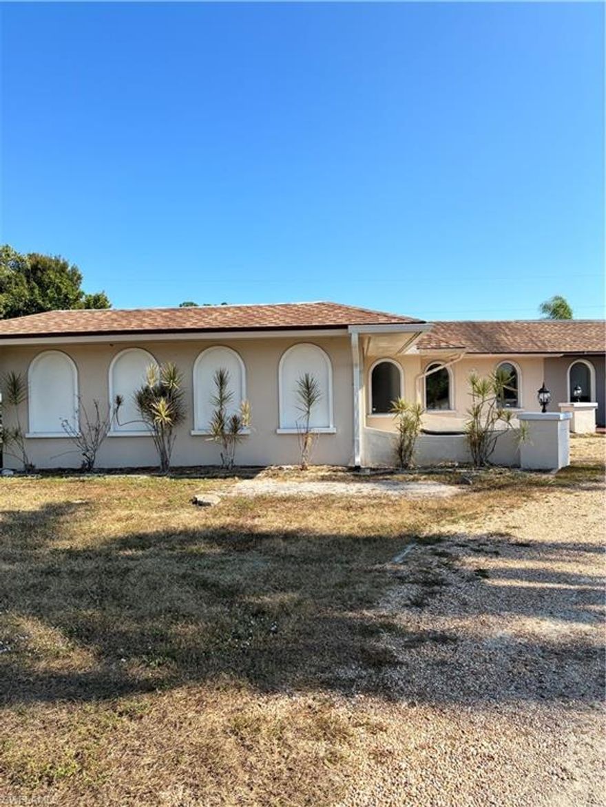 Half Duplex in SE Cape Coral with two bedroom+ den two bath and two car garage. Ideally located in a convenient area of Cape coral.  This property is perfect for homeowners or investors seeking strong rental potential area, an oversized lanai. Assessments are paid.