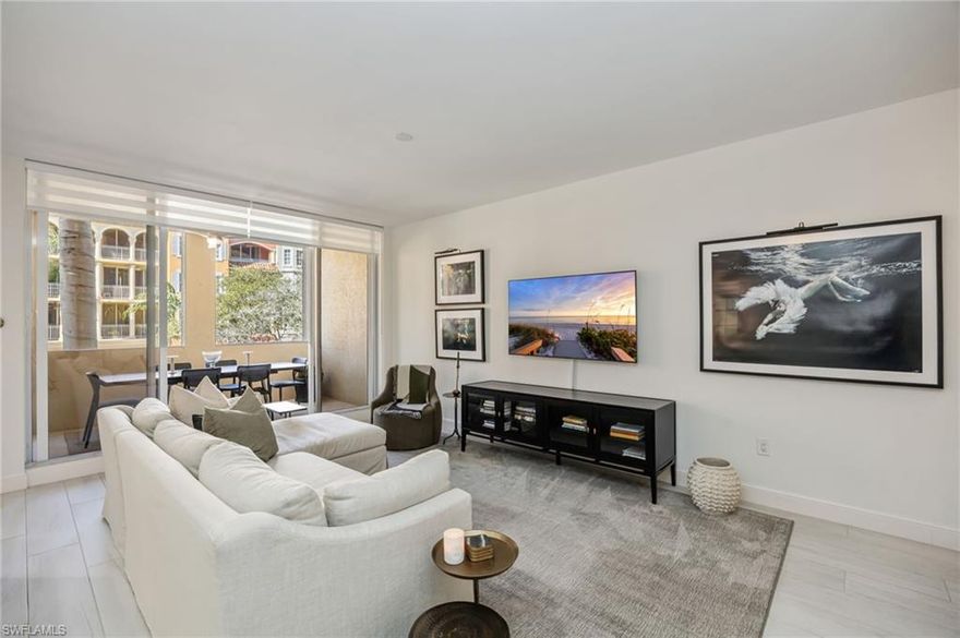 Location and Sophistication converge in this chic 1-bedroom + den oasis at Bayfront Place. This 1,126 sq ft haven boasts a unique floor plan to accommodate your lifestyle with a spacious living area, a sleek kitchen, and unique designer upgrades.  The kitchen has BRAND-new stainless-steel Samsung appliances, including an induction range, and a custom coffee bar that adds stylish function. and storage.  Unwind in the king-size master suite with a private balcony, or host guests in the spacious den with a sofa bed. Both the den and living room open onto a breezy balcony, perfect for morning coffee or sunset cocktails. Plus, you can live worry-free with the new A/C just installed in January 2026.  Bayfront offers a lifestyle of convenience, excitement, and relaxation, perfect for those seeking the best of Naples.  An array of luxurious amenities are available on-site including 2 pools, 2 spas, a fitness center, grills, pickleball, tennis, and many outdoor spaces. Bayfront also is home to a selection of delicious restaurants, a unique waterfront Cabana bar, and an adventure shop offering boat rentals and outdoor excursions.  Located just minutes from the heart of Naples, you’ll have easy access to vibrant Fifth Avenue, the charming Third Street South area, and the cultural hub of the Design District.  Explore the revitalized Bayshore Arts District, relax on the sandy beaches of the Gulf, catch a performance at the new Gulfshore Playhouse, enjoy tranquil moments at Baker Park, and discover more unique shopping and dining experiences, all within a short distance.