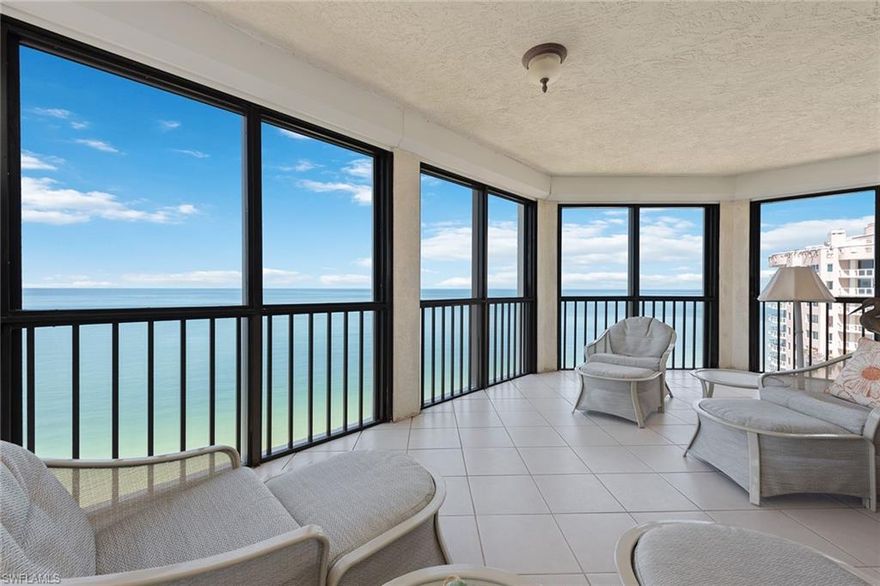 Gorgeous high-floor Gulf views. This spacious and open three-bedroom plus den with three-and-a-half baths is an end unit, featuring panoramic, oversized windows with tons of natural light and two expansive wraparound screened-in lanais with electric storm shutter protection. Outdoor spaces are exceptionally wide and spacious, perfect for sunset relaxation and entertaining year-round. The master suite and guest bedrooms are situated on opposite ends of the residence to ensure maximum privacy and comfort, and each features well-appointed en-suite baths. The Carlysle has upgraded the beauty and appeal of its entry and welcoming lobby spaces and is currently upgrading the elevator hallways. Private Bay Colony Beach Club, tennis club and all of the Pelican Bay amenities are available to be enjoyed by residents.