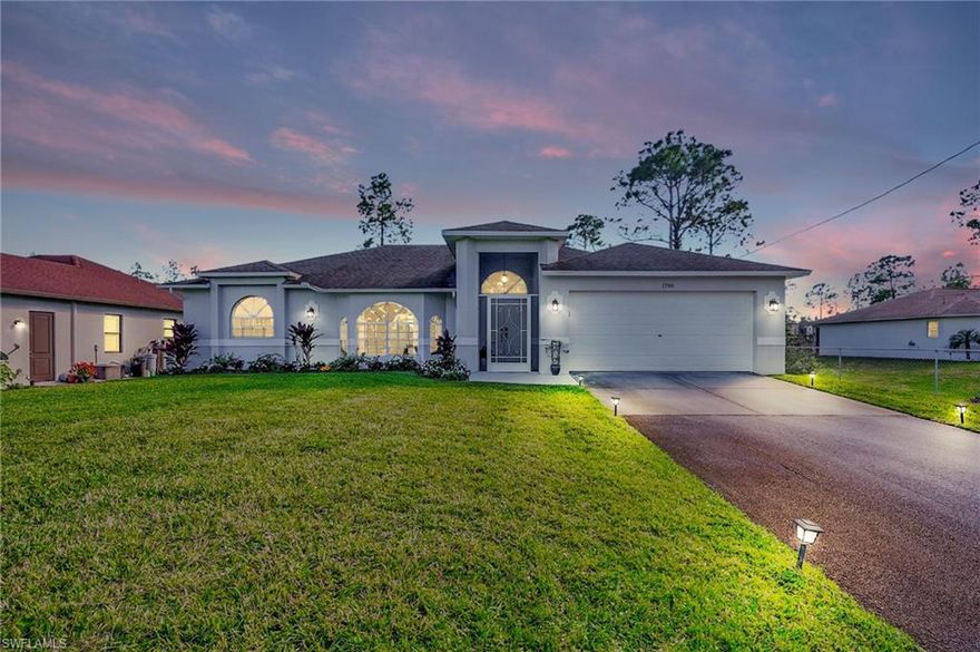 Remarkable "Golden Gate Estates" upgraded ($75K+/-) 3 bedroom + den, 2 bath, 2 car garage and pool family home! This house features an open floor plan, vaulted 16' ceilings, and a chef's kitchen with lots of cabinetry, center island, pantry + eat-at-bar.  The combination of the southern exposure and abundance of windows + sliders allow the home to be light-bright & sunny year-round. The large master bedroom & bathroom has his/her closet, dual sinks, soaking tub, walk-in shower & direct walk-in/out access to the expansive screened-in pool deck. Home is close to schools, churches, major shopping, restaurants, hospitals and RSW international airport. Homes comes with a 1yr. home warranty for total buyer comfort.
