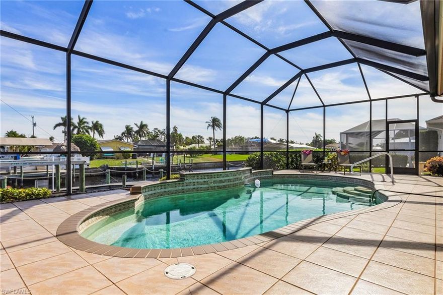 This is a VACATION RENTAL only. Owner will not consider annual rentals. Weekly rentals are welcome.
Welcome to Villa Aveline! This gorgeous waterfront home is perfect for a fun Florida getaway. This 4 bedroom 2.5 bathroom home boasting 2,523 sq. ft. is great for a family getaway. It is perfectly located in the coveted SE Cape on a Gulf Access canal with eastern exposure where you will see gorgeous sunrises. There are also a variety of shops, golf courses, airports, and beaches within a short distance drive. The Boat Lift is not available.

KEY FEATURES: This home is pet friendly.

Living Room: The living room offers plenty of seating, a flat-screen TV and a view of the pool. 

Dining Room: Located to the left of the front entry, you will find a formal dining room with seating for six. 

Office: Located right off of the Primary Bedroom offers a desk w/ chair and relaxing chair where you can enjoy a good book.
 
Kitchen: The spacious kitchen comes fully equipped with anything you could need, featuring granite countertops and counter seating. 

Breakfast Nook: This breakfast nook offers seating for 4. 

Primary Bedroom/Bathroom: You won't find a retreat more serene than this primary bedroom, which offers a king-size bed, walk in closets, flat screen tv and slider that leads out to the pool area. The en-suite primary bathroom offers a beautiful jetted soaking tub, his/hers vanities, and walk thru shower. 

Guest Bedrooms/Bathrooms: Two of the guest bedrooms offer a queen-size bed. The third guest bedroom features 2 twin size beds. All of the guest bedrooms share the second bathroom, which features a tub/shower combo. The pool bath can be accessed from the lanai. 

Lanai/Pool: Outside on the lanai, you will enjoy your very own tropical oasis, complete with an electric pool, dock and boat lift. This area features plenty of outdoor seating to entertain friends and family. While enjoying the tranquil atmosphere, relax on the loungers by the pool or fire up the grill and enjoy a delicious dinner. 

We are sure you will experience your dream vacation.

What are you waiting for? Book Villa Aveline now!