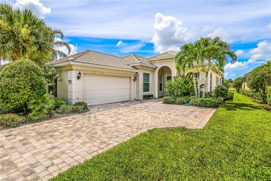 This highly-coveted "Oakmont" model features beautiful Southern-facing water views perfect for relaxing in your pool and spa. Featuring 3 Bedrooms plus Den and an open-concept, spacious floorplan that provides ease for entertaining. In the kitchen, you will find upgraded stainless steel appliances, dining area, or enjoy your morning coffee casually at the counter bar. This home is meticulously maintained, with updated custom built-ins, and is offered with negotiable furnishings for an easy move. 

Verona Walk is a unique community with an on-site restaurant/bar, hair salon, gas station, post office, and car wash. There are miles of walking/jogging, as well as tennis courts, bocce, pickleball, and fitness center for your busy, active lifestyle. Throughout your time here you can also take part in many community events to meet your neighbors and settle into Naples living. There are 4 public golf courses within an 8-mile radius, restaurants located just outside the entrance and beyond, grocery stores and shops within 3 miles and less than 13 miles to both Naples and Marco Island Beaches.