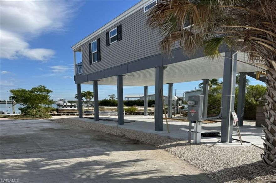 • BRAND NEW, SALT-AIR FRESH AND READY TO IMPRESS. Newly constructed waterfront home offering beautiful back bay views and direct Gulf access in an unbeatable Fort Myers Beach location. Just minutes to popular island restaurants, the Key West Express, and a short trip over the Matanzas Pass Bridge to the famous sands of Fort Myers Beach and Estero Island, this is coastal living with convenience built right in.
• Engineered for peace of mind, the home features the installation of a moment-resisting steel structural frame in conjunction with concrete reinforced grade beam foundations, meeting current hurricane code standards for Southwest Florida. Boating enthusiasts will appreciate a dedicated place to dock a small recreational boat, while the versatile ground-level space offers the flexibility to create a garage, storage, or a space tailored to your lifestyle needs. 
• Designed for the Southwest Florida lifestyle, this home delivers the ultimate retreat with brand new everything, modern finishes, and a setting that turns everyday living into a waterfront escape. Wake up to breathtaking bay views, spend your afternoons on the water, and enjoy evenings close to the energy and charm of the island.
• Ideal as a full-time residence, vacation getaway, or income-producing property, the flexibility here is unmatched with no rental restrictions, no age restrictions, and extremely low HOA fees. Add in new construction peace of mind and you have a rare opportunity in a prime location.
• Additional photos and videos coming soon.