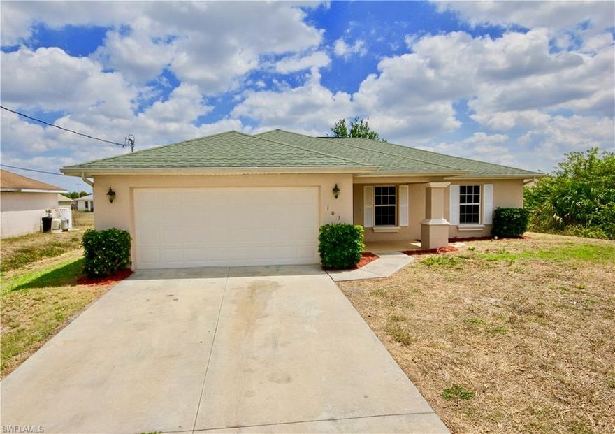 MOVE IN READY 3 Bedroom 2 Bathroom home w/Den on a canal. Located in one of the most desired area in Lehigh Acres due to the close access to I-75 and SR-82. Freshly painted with dark wood flooring. Mature oak trees in the yard. Great first time home or any investor looking to expand there portfolio. Call today for a private showing before it is gone!