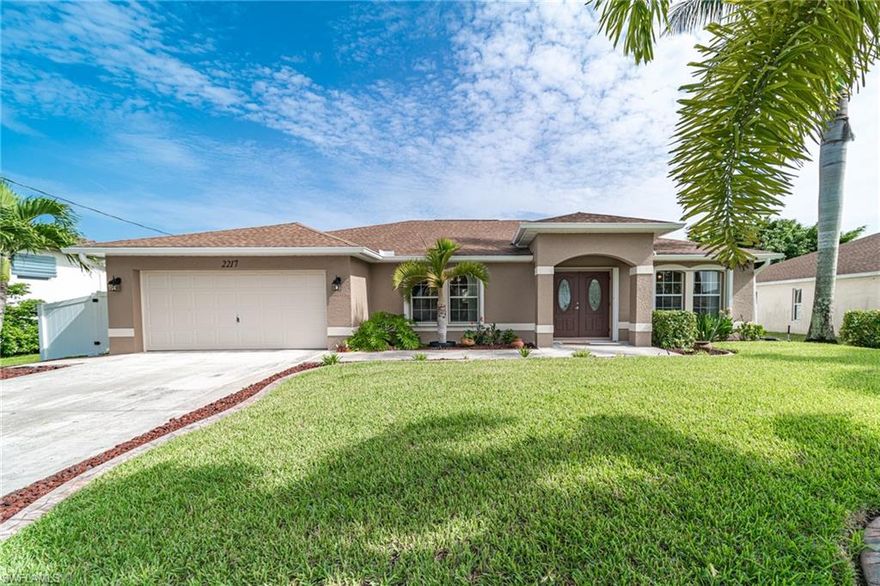 This is what you've been waiting for!! Amazing POOL HOME boasting with "Pride of Ownership." As you enter the home, you have 24" porcelain tile laid diagonally. Gorgeous Kitchen with Upgraded Custom Cabinets, Granite countertops with New Appliances (Fridge and Oven), Master Suite has two large walk-in closets, Newer A/C (2018), Whole-Home Reverse Osmosis system, Tankless Hot-Water Heater, Professionally Installed 6' Privacy Fence, Hurricane Accordion Shutters, Electric Pool Heater, Oversized Brick Paver Lanai surrounding the Pool, Mature Fruit Trees including, Mangos, Oranges, and Palm Trees with Coconuts And concrete curbing! This home is gorgeous in person, a must-see! Close to the Beaches, Shopping, Restaurants, International airport, and Hospitals. Call today for your showing!