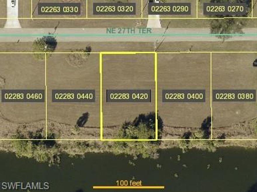 Nice building site on freshwater canal with southern exposure in growing area! Convenient to US 41, Pine Island Rd, parks, restaurants, shopping and more! City water and sewer available! Buyer assumes balances of assessments. Adjacent building site at 1806 NE 27th Ter is also available. Purchase both and combine into one huge building site or own two separate building sites!