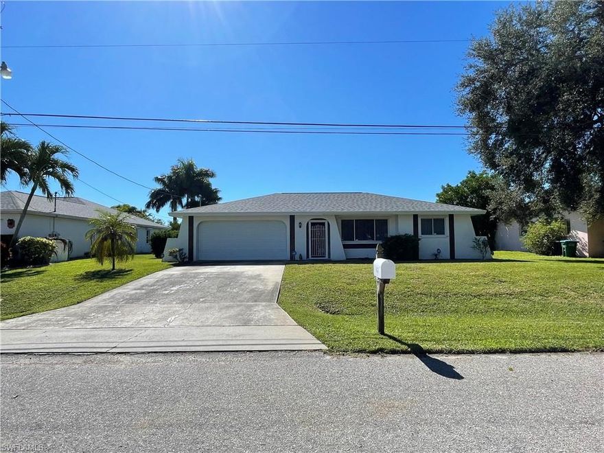 PRICED to SELL & Ready for YOU! IMMACULATE ONE-OWNER 3 BR 2BA much-loved & meticulously maintained split bedroom floor plan with an oversized 2-car garage & spacious screened lanai~~IDEALLY LOCATED in the heart of Cape Coral near everything you need~~Walmart, fine & casual restaurants, Coralwood Mall & movie theater, health care, golf & entertainment. BRAND NEW ROOF; A/C 2015. Newer water heater. Update this one to you own taste, budget, and timeline! Re-piped in 2004. Electric & manual storm shutters. City water, sewer, and irrigation~~ALL ASSESSMENTS PAID. Washer & Dryer included. Property is offered fully furnished, but any items the buyer does not want will be removed.