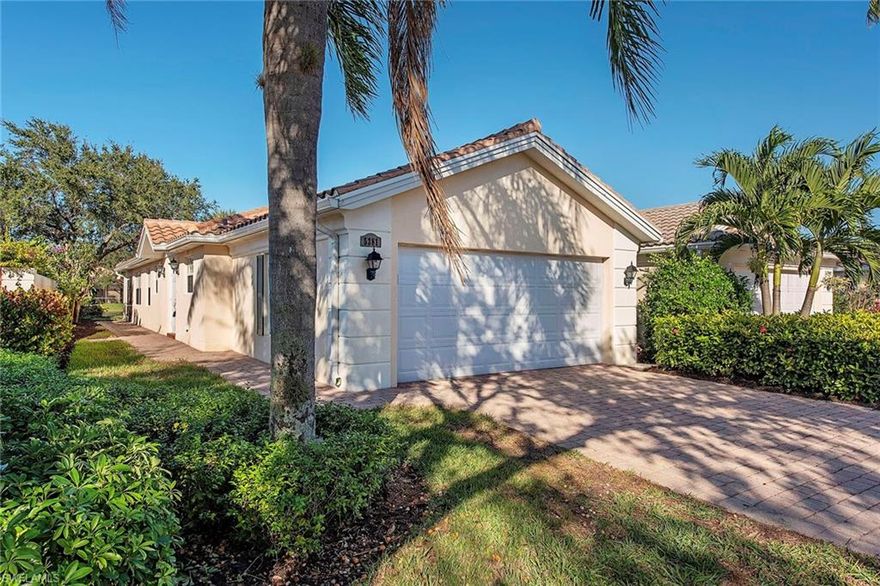 Enjoy a beautiful view and tranquil breezes in the private lanai of this move-in ready lakefront villa in the popular Island Walk. Offered turnkey furnished with a new roof and a great location within a short distance to the town center and all the amenities Island Walk has to offer, including a resort-style pool lap pool, fitness center, tennis courts, bocce, putting green, restaurant, gas station and more. All this and a few miles from our sandy beaches and famous shops and restaurants.