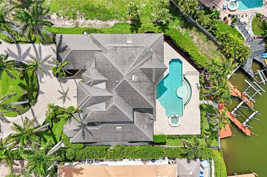 Photo of 384 Mooring Line DR, NAPLES, FL 34102 (MLS # 225055113)