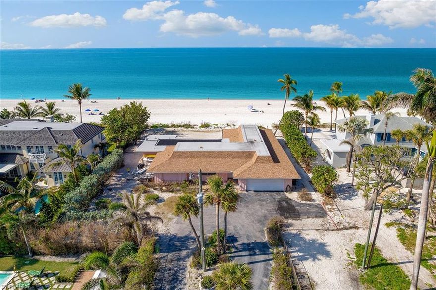 Presenting a rare and incredible opportunity to build your dream home on this beautiful interior beachfront lot in the heart of Old Naples. This exclusive .47-acre property has 114 feet of beach frontage on the Gulf of Mexico, with striking postcard views of the Naples pier. Enter the unique interior location by a private drive off of Gulf Shore Boulevard, which offers tremendous privacy from the public beach access. Located a few short blocks from shopping and dining on Fifth Avenue and Third Street with proximity to all that Naples has to offer. The existing Rutenberg El Dorado home sustained damage to the residential structure and the property is being sold "as is" for the lot value and any demolition, permitting, repairs, etc. will be the responsibility of the purchaser. Do not walk on the property without permission.