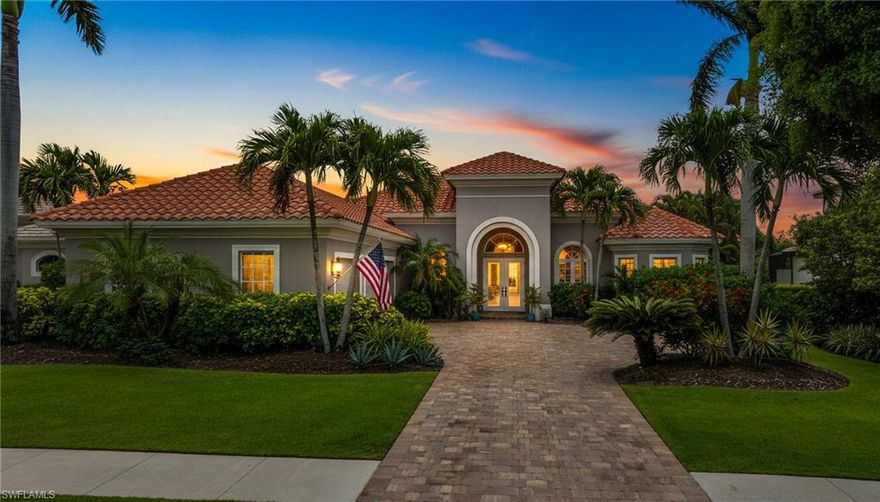 NEVER BEFORE LISTED in West Bay Club, this beautifully appointed custom home is set on a .57-acre lot and offers 3 bedrooms plus den, 3 full bathrooms, and a 3-car air-conditioned garage, blending timeless character, everyday comfort, and the indoor-outdoor lifestyle Southwest Florida is known for. Thoughtful architectural details set the tone throughout, including arched doorways, arched windows, custom moldings, tray and volume ceilings, built-in shelving, French doors, and easy-maintenance tile flooring in the main living areas. The great room opens seamlessly to the expansive screened lanai through 10-ft sliders, creating a natural flow for entertaining, relaxing, and enjoying the peaceful landscaped setting. The lanai feels like a true outdoor living room with a separate covered dining area, comfortable lounging space, built-in grill, outdoor kitchen with its own bar, outdoor fireplace, saltwater pool, and heated spa—perfect for morning coffee, sunset cocktails, weekend gatherings, and effortless al fresco dining. Inside, the kitchen offers generous cabinet space, a walk-in pantry, work island with second sink, breakfast bar, and casual breakfast nook overlooking the pool. The spacious owner’s suite features a sitting area and direct lanai access, while the perfectly appointed guest bedrooms and bathrooms offer the kind of comfort any guest would enjoy. A wet bar with wine cooler adds another polished entertaining touch, while impact-resistant windows and doors, gas cooking, new AC in 2025, and thoughtful storage make the home as functional as it is inviting. Beyond the residence, enjoy an exceptional active lifestyle within one of Southwest Florida’s most distinctive member-owned communities, set across hundreds of acres of preserved nature and wetlands. Anchored by a championship Pete and P.B. Dye–designed golf course, West Bay Club blends world-class golf with coastal living and an engaging social atmosphere. Residents enjoy a private Gulf-front Beach Club with full food and beverage service, beach attendants, and effortless seaside dining, along with a resort-style pool and the Bay House gathering space overlooking Estero Bay. Multiple dining venues range from casual fare to refined cuisine, complemented by a lively sports bar and a vibrant social calendar that keeps the community connected year-round. A state-of-the-art fitness center overlooks the pool and course, while recreational amenities include Har-Tru tennis courts, pickleball, bocce, shuffleboard, scenic walking and biking paths, a dog park, playground, and access to kayaking, canoeing, fishing, and boating from the community’s riverfront park and launch with access through Estero Bay to the Gulf. Ideally located just east of US-41, West Bay Club places you minutes from Coconut Point, Miromar Outlets, Hertz Arena, white-sand beaches, and Southwest Florida International Airport, delivering a lifestyle that is both private and perfectly connected.