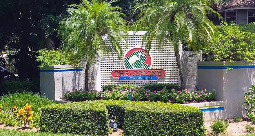 New Price for this amazing condo with so many updates!! 622 Wiggins Bay Drive Unit C-22 in Naples, FL 34110 is a second-floor, 2-bedroom, 2-bath condominium (built in 1987) spanning about 1,390 sq ft. Nestled within the lush, gated Colony at Wiggins Bay community, it overlooks preserved woodlands and features a screened lanai for peaceful relaxation. The interior includes tile flooring, vaulted ceilings, a well-appointed kitchen with stainless-steel appliances, and in-unit laundry for comfort and convenience. Recent upgrades such as a newer A/C and water heater add modern efficiency, while a dedicated covered carport provides parking. Residents have access to a resort-style community pool and BBQ area, and can optionally join the nearby Tarpon Cove Yacht & Racquet Club for amenities like tennis, fitness, dining, a tiki-bar pool, and beach shuttle service. Its location offers serenity while still being close to shopping, dining, and Gulf-accessible nature.