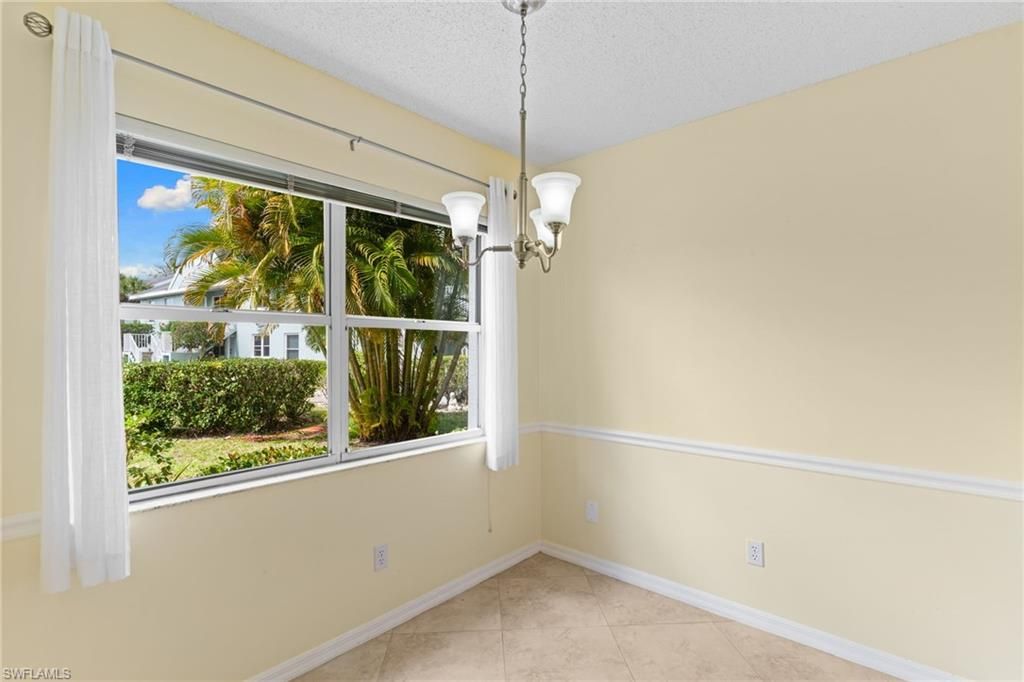 Photo of 177 Grand Oaks WAY #101, NAPLES, FL 34110 (MLS # 226009809)