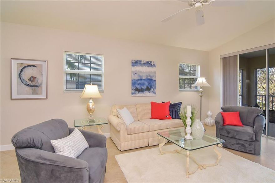 PEACEFUL 2 plus Den AND formal dining END Unit in popular Calusa Bay!  The BRAND NEW ROOF is a huge plus and soon the community pool area will have a new screen enclosure (and a new roof). One of the most desirable floor plans flows seamlessly with 3 exposures north, south and west.  Lovely lake and water feature view, open yet private. A touch of Nantucket echoed in Master bath double sink vanity, clean coastal lines carried to the kitchen with designer lighting, granite, stainless steel appliances and more in this renovated carriage home with detached garage.  Beautiful porcelain tile throughout main living areas with quality carpet on stairway and in bedrooms. Abundant amenities offer a resort lifestyle in this treasured community. Whether full time or part time you'll love the convenient proximity to the Gulf of Mexico and the white sandy beaches here in Naples, the vast array of shopping and dining such as Mercato with the convenience of Whole Foods, wonderful eateries, and entertainment, Vanderbilt Galleria or Waterside Shops.