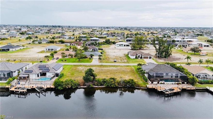 Imagine the possibilities with this magnificent gulf access lot, perfectly positioned on Watermelon Canal in the highly desirable part of NW Cape Coral. As you envision your future here, you'll be captivated by the tranquil views and the peaceful atmosphere. It's more than just living; it's about experiencing a lifestyle that balances comfort and relaxation with the excitement of coastal living. Strategically located just east of Old Burnt Store Rd, this lot places you minutes away from the open Gulf waters with only 1 bridge with 9’ clearance. The potential for waterfront bliss is endless, from boating escapades to tranquil evenings by the water with amazing sunsets. With brand new homes being built this area is highly sought after. Also the upcoming 7 Islands development elevates this opportunity, promising a host of new amenities including fine dining, shopping, and recreational activities. This addition will not only enhance your lifestyle but also add value to your investment. Don't let this opportunity sail away. Secure your piece of paradise in NW Cape Coral, where your dream waterfront lifestyle awaits. Build your dream home here. If you need a builder I can help there too.