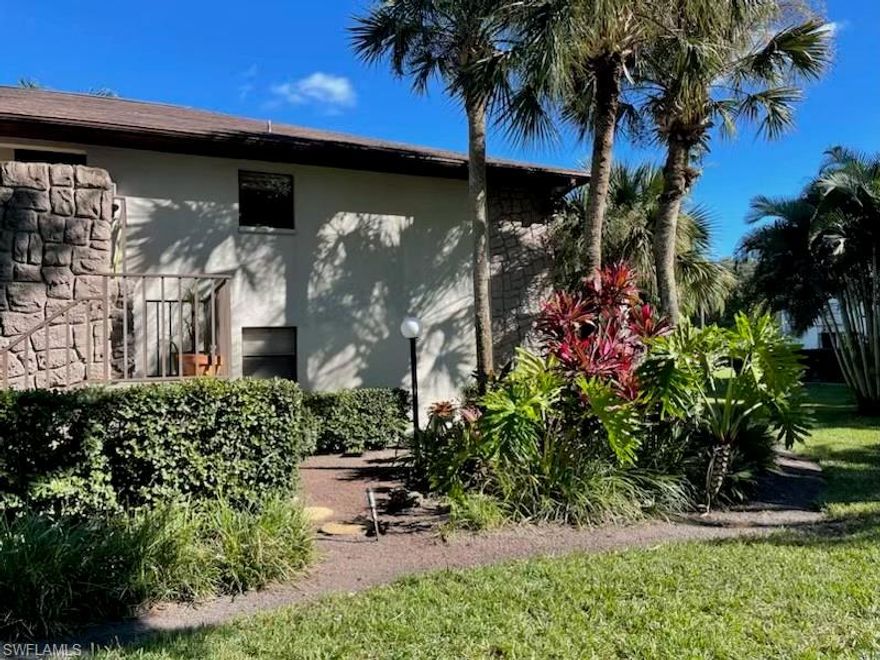 This is a second floor end unit with split bedrooms. Floors are manufactured hardwood, laminate and tile. The breakfast bar will sit three very comfortably. This is a 55+ community that does not allow pets. There is a laundry room inside the unit. The large screened lanai is accessible via sliding glass doors from both the living room and the master bedroom. The easterly view from the screened lanai is of the heated swimming pool and lighted tennis court/pickleball court. The westerly view from the front deck is a park like setting with lovely gardens. There is assigned covered parking for owners and ample guest parking available. This community (Stone Edge) sits in the heart of Lehigh Acres with quick access to our international airport, I-75, Jet Blue Park, etc. There are three golf courses within 15 minutes.