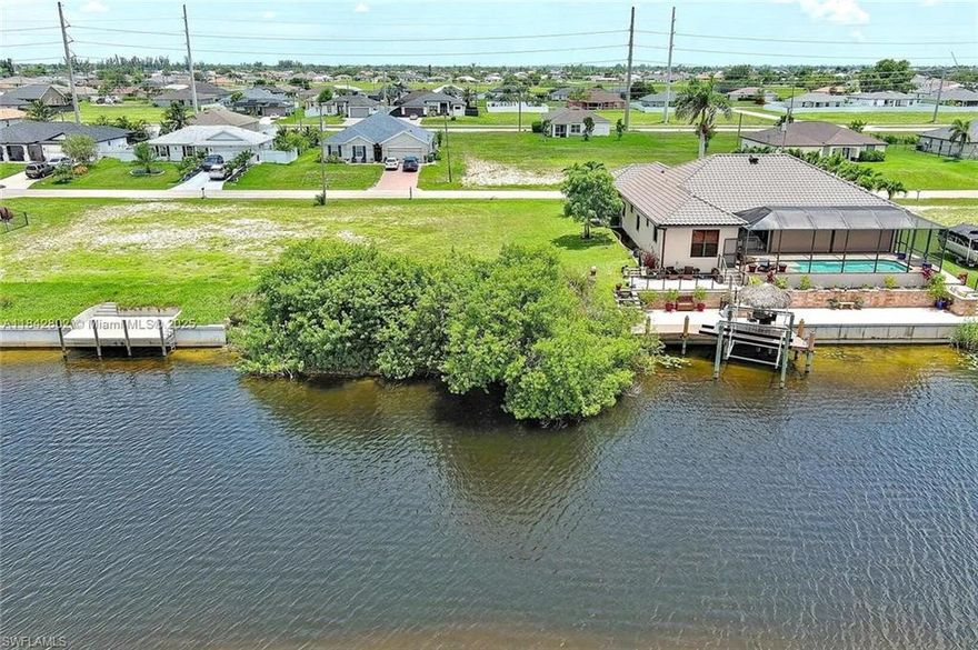 Discover the perfect blend of tranquility! This .23 acre lot is located on a desirable freshwater canal lot, offering beautiful backyard views and access to miles of scenic canals—perfect for kayaking, fishing, or simply relaxing by the water. The large lot provides ample space for a future pool or outdoor entertaining area, all with waterfront living. Located in a quiet NW Cape Coral neighborhood with easy access to shopping, dining, and parks. Ideal for full-time living, a seasonal retreat, or a rental investment. Don’t miss out on this slice of Southwest Florida paradise!