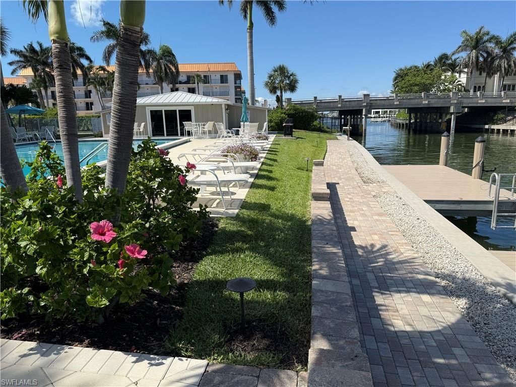 Photo of 2880 Gulf Shore BLVD N #404, NAPLES, FL 34103 (MLS # 225075943)