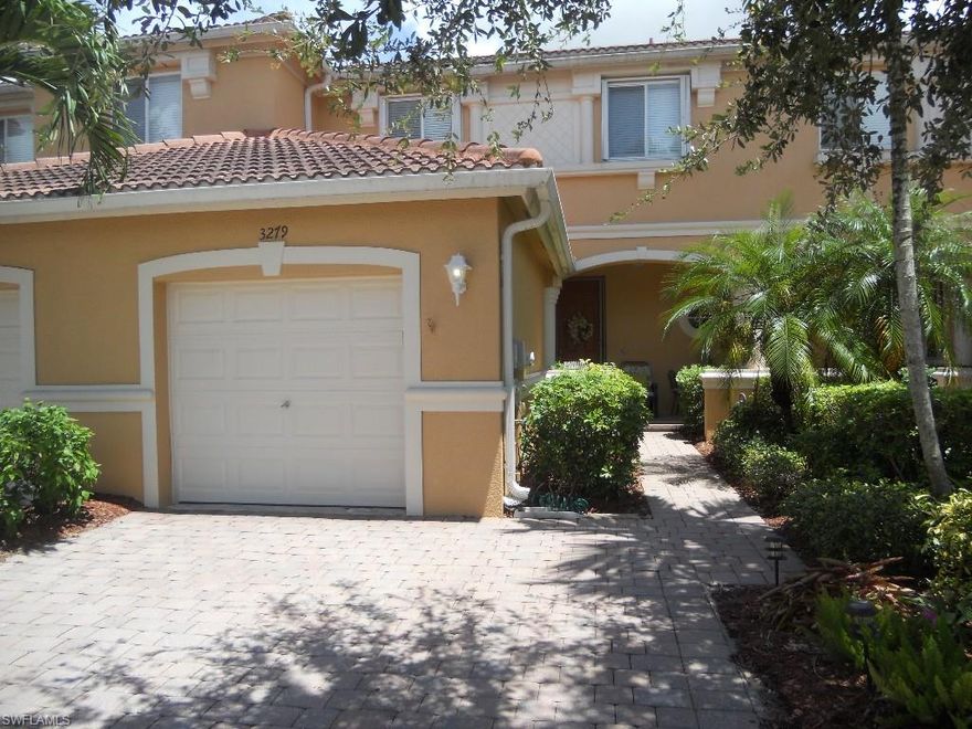 Must see!! Immaculately maintained and spacious townhome with three bedrooms/2 full baths and a half and attached garage is loaded with upgrades. This great home has an updated kitchen with raised panel cabinetry, granite countertops, an island, and top of the line Samsung stainless steel appliances. Home is wired for a whole house generator, has accordion hurricane protection upstairs & panels downstairs and a brand new (2014) A/C and air handler to the tune of over $5000. It has all tile downstairs, a screened front door, coded front door entry, rod iron staircase, crown molding, newer ceiling fans and light fixtures to name a few upgrades.  Home has tile roof, brick paver driveway and brick paver screened lanai which backs up to a preserve for great privacy. Seller has agreed to leave dining room table and hutch as they match dining room light perfectly. Colonnade is a gated community w/ low fees of $195 per mo. with great amenities such as pool, spa, tennis & basketball courts, fitness center, clubhouse, playground, grilling pavilion, and more. Walking distance to nice restaurants and shopping and short distance to I75 and beaches.  Call today to view this gem!!