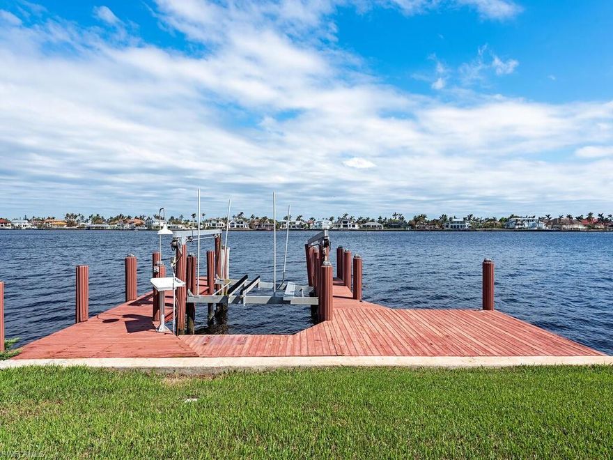 H7337 - Build the bayfront home of your dreams! Sweeping bay vistas and twinkling evening lights await from this remarkable parcel, ideally situated directly on Naples Bay in Aqualane Shores, one of Naples' first developed waterfront communities.  With stunning properties surrounding this offering, direct access to several deep-waterways, and palm tree-lined boulevards, this community touts an array of local establishments - all the while located a short stroll to Naples' sugar sand beaches.  Being sold As-Is for lot value only.