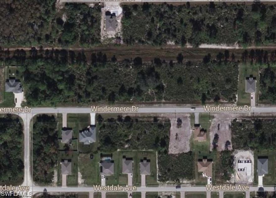 PERMITS APPROVED. Beautiful lot with a canal at the rear, located in a well-maintained subdivision with a strong sense of community and plenty of nearby neighbors. This property offers the perfect blend of tranquility and convenience, with a clean, organized environment surrounded by nature. Whether you're looking to build your dream home or make a smart investment, this lot is an excellent opportunity. Enjoy serene canal views and the welcoming atmosphere of an established neighborhood!