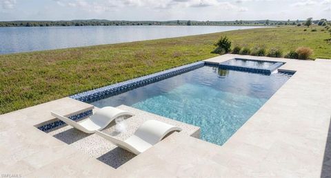 Photo of 8718 Driftwood DR, NAPLES, FL 34114 (MLS # 226014764)