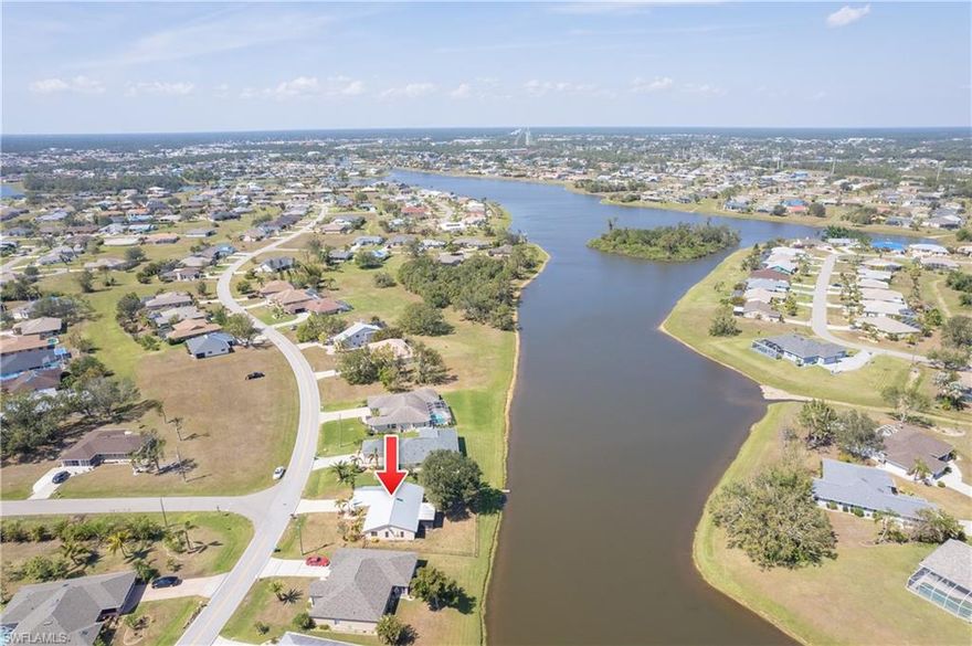 Location is Everything - Deep Creek Lake Zapa Waterfront Home - This Absolutely Beautiful 3 Bed/2 Bath/2 Car Garage waterfront home in the Very Desirable location on Lake Zapa boasts pride in ownership, and many recent renovation updates have been made including 2022 HVAC, 2018 Metal Roof, as well as new cabinets, countertops, and tile floors. wonderful Great Room for your family and friends' privacy and entertainment while visiting you at this wonderful slice of Southwest Florida paradise. Enjoy the bliss of watching the active wildlife on the lake from your screened in lanai or your air conditioned Florida Room. Plenty of room to put in a brand new sparkling blue pool to your specifications. Roughly 5 mins to the Deep Creek Golf Club and the new Sunseeker Resort with 20 Food and Beverage destinations is just a short 11 min car ride away. Just over the bridge, you will find Fisherman’s Village and downtown Punta Gorda, voted the 2nd best small town food scene by USA Today. Don’t miss Boca Grande with its beautiful aqua blue water and Englewood beach's sugary sandy beaches. What are you waiting for? Visit for the beloved SWFL lifestyle, stay for the amazing Sunshine Days LIFE!