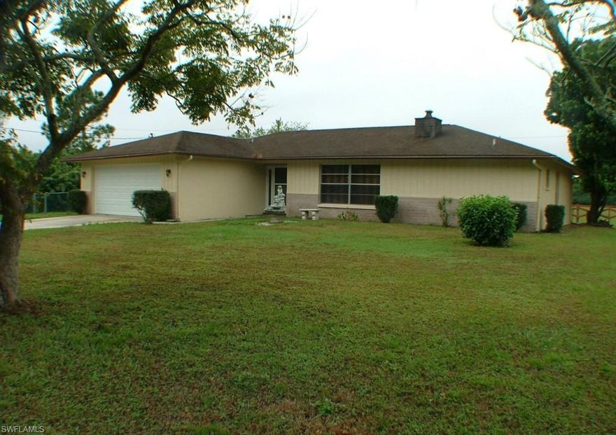 Hard To Find Single Family Home Under $150K That Is Not A Handy-Man Special! * 2 Bedroom, 2 Bath, 2 Car Garage * Approx 1,527 Sqft Living Area Under Central AC - Plus An Enclosed 18 X 10 Back Porch w/New Tile Floor & Wall AC For Another Approx 180 Sqft Of Living Area For A Total Of Approx 1,707 Sqft Of Living Area! * Not A Foreclosure Or Short Sale - Quick Occupancy OK *  Approx Half Acre Lot * Surrounded By Other Large Acreage Homes * Quick & Easy Access To I-75 * Central Water & Septic - Well On Property Too * Wood Burning Fireplace * CBS Construction * Fenced Yard w/Separate Fenced Area For Pets * Fresh Paint * New Garage Door * New Stainless Steel App In The Kitchen * Master Bath Has Large Open Shower - Wheel Chair Accessible * 11 X 10 Open Back Porch * Great Room w/Split Floor Plan * Inside Laundry Room w/New Washer & Dryer * Western Rear Exposure - Great Sunsets * Sold AS-IS, But FHA Offers Are Welcome * Very Easy To Show! *