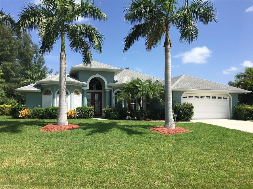 Move in ready; quiet, scenic, freshwater view of intersecting canal home w/saltwater pool & outside "shower" on a half-acre +/- residential lot w/beautiful private mature landscape to include 17 Royal Palms. This alluring upgraded "clean" home has beautiful front double entry doors entering the living rm, granite kitchen & breakfast nook all under a vaulted ceiling. Rear family rm has a tray ceiling & the 2 guest bdrm's have lovely bay windows. The master bdrm includes an over-sized walk in closet, a tray ceiling & double doors out to the private lanai/pool. Master bath has 2 sinks, a sizable shower & separate soaking tub. Kitchen has numerous cabinets, a deep double sink, stainless appliances & a large pantry. Big laundry rm. Accordion hurricane shutters cover windows on all sides of home to include lanai. Home has surge protection. It's a "must see". The freshwater canal goes to two lakes & quite a distance (under Veterans Pkwy). Watch kayaks & canoes, pontoons & freshwater fishing from your pool.
Located just a short walk to the Cape Coral Library, its public activities & events and Walmart Neighborhood Market at Skyline & Mohawk.