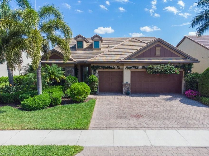Welcome home to Camden Lakes, a gated, natural gas community in North Naples West of 75. This Cameron model will WOW from you the moment you step through the stained-glass front door with its soaring ceilings and light, bright open concept design. There’s room for everyone with three large bedrooms and three full bathrooms plus room for all of your toys in the three-car garage. The chef’s kitchen features double islands, top-of-the-line stainless steel appliances, gas cooktop, a large pantry and more cabinet space than you could ever need. Entertain seamlessly from indoors to outdoors as your guests cross from the large family room through disappearing sliders where you’ll soak up the Florida sunshine in your freeform, gas-heated, salt-water pool and spa with a tranquil, wide lake view. Retreat to your den/office for quiet moments or to work from home. Other upgrades include: tankless hot water heater, built-in wine cooler, all impact doors and glass, granite in all bathrooms, custom owner’s closet, and panoramic lanai screen. HOA fees include landscaping, landscape irrigation, year-round heated resort style pool, clubhouse, fitness center, and more!