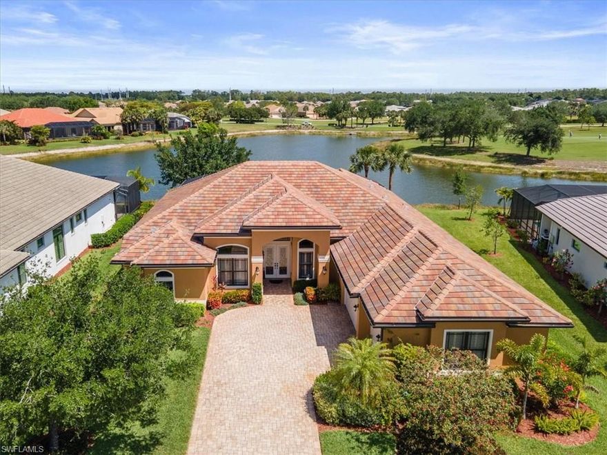 Discover the pinnacle of luxury Florida living in this custom built pool home by Pinnacle Development Group, all on one level in River Hall Country Club's prime location. Enjoy rare panoramic golf course and lake views with total privacy, no golf balls or cart traffic and framed by a 100' wide rear lot in a no flood zone.
Seamlessly blending indoor and outdoor flow, the versatile layout offers 3 bedrooms + den (easily a 4th BR), 3 baths, grand living room, family room with electric fireplace, formal dining, game room, and chef's kitchen with nook, bar seating, and serving cabinetry and all enhanced by 5 tray ceilings. The primary suite shines with spacious walk in closets featuring custom built ins and a serene private retreat.
Outside, an expansive under truss lanai with picture window screening and Storm Smart shutters leads to a resort pool with waterfall, 8-person hot tub, and outdoor kitchen, all against tranquil fairway vistas. Move in ready with pride of ownership updates: new 2025 A/C (main area), 2023 lighting, impact windows/doors, 2020 roof, 2021-22 paint, sealed pavers. Dream 913 sq ft 3-car garage brims with built in storage! Bundled in River Hall no equity buy in, initiation, or food minimums, you get an 18-hole Davis Love III course, par-3 practice, 2 driving ranges, clubhouse, pro shop, bunker bar/pool, resort pool, restaurants, tennis, fitness, bocce, pickleball, plus cable, WiFi, lawn/irrigation maintenance. Sunshine, palms, and the ultimate Florida lifestyle await! Tour this spectacular gem today!