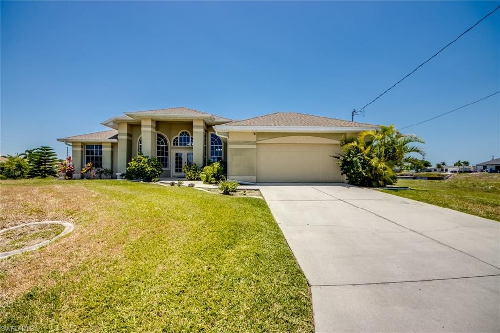Photo of 2319 NE 19th ST, CAPE CORAL, FL 33909 (MLS # 2025018186)