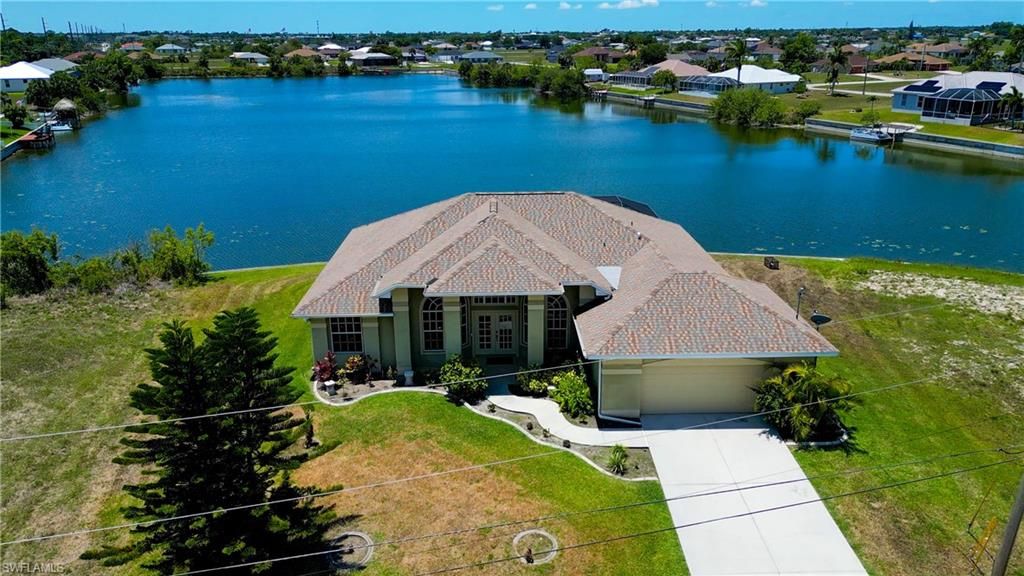 Photo of 2319 NE 19th ST, CAPE CORAL, FL 33909 (MLS # 2025018186)