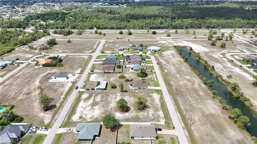Build your dream home in the growing community of Cape Coral! This vacant lot located in the desirable NW area offers an incredible opportunity to invest in one of the city’s fastest-developing neighborhoods. Surrounded by beautiful new homes and ongoing development, this property is perfectly positioned for future growth and long-term value.

Enjoy a peaceful and tranquil neighborhood while still being close to everything Cape Coral has to offer—shopping, dining, schools, parks, and convenient access to main roads. With exciting development happening throughout the NW Cape area, this lot is ideal for building a custom home and creating the perfect setting for family life.

Experience the relaxed coastal lifestyle that makes Cape Coral so desirable. Whether you're planning to build now or invest for the future, this property offers the perfect combination of location, growth potential, and quality of life.