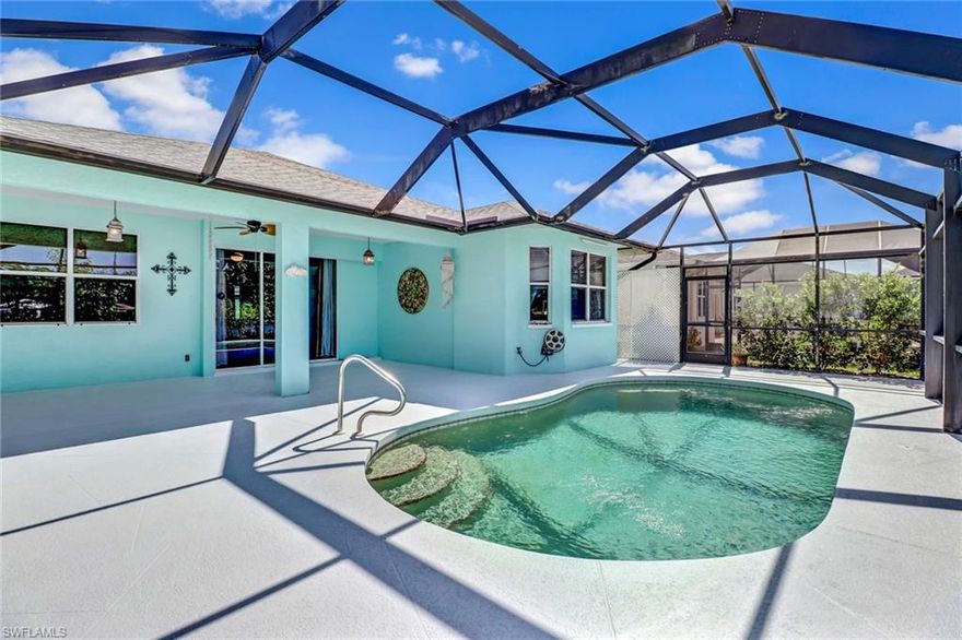 Beautifully remodeled pool home with wide lake views! This home stands out with a remodeled kitchen and open floor plan. BRAND NEW ROOF WITH A 10 YEAR WARRANTY AND A NEW AIR CONDITIONING SYSTEM WITH A 5 YEAR WARRANTY, as per seller. There is lots of natural light! You will fall in love the moment you walk through the door! There is a custom built in desk off of the kitchen area. The pendant lighting and stainless steel appliances compliment the open kitchen design. Brand new GE stainless high end dishwasher just installed! Large covered screened lanai. Bamboo wood flooring in the bedrooms and tile in all living areas. Beautiful accent interior window and stained glass window in master bath. Lemon and Avacado trees in the back yard. Additionally, there is a community pool, clubhouse and playground in the front of the community. Schedule a showing now before its too late.