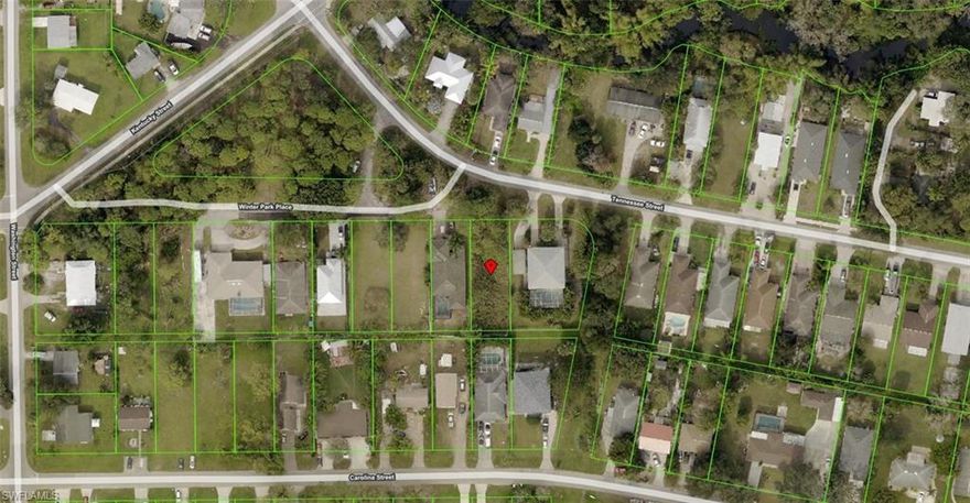 Residential lot in the heart of Bonita Springs, suitable for immediate construction of a new single-family home. Survey will be provided to Buyer at time of contract.