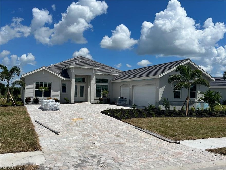 Wild Blue provides a unique and rare opportunity to enjoy SWFL life at its fullest with 800 acres of freshwater lakes to 1300 acres of preserve. Luxury resort-style amenities include Clubhouse with formal/casual dining, resort pool, poolside café bar & grill, bocce ball & horseshoes, tennis, pickleball and basketball courts, day spa, yoga & event lawns, fitness & aerobics centers, boat & kayak launch, playground & white sandy beach. The versatile Baneberry home offers 3,178 of living space, perfect for family & large gatherings. Luxury white
cabinetry, 8x48 Butter Pecan plank tile flooring throughout, quartz countertops & backsplash, GE Profile Appliances, wood shelving in closets, blinds, natural gas and hurricane impact windows & doors. Beautiful preserve & water views, complete with outdoor kitchen, porcelain deck, pool & spa with negative edge water features! Virtual tour is of our Iris model & photos are used for display purposes only. Estimated delivery July/Aug 2023.