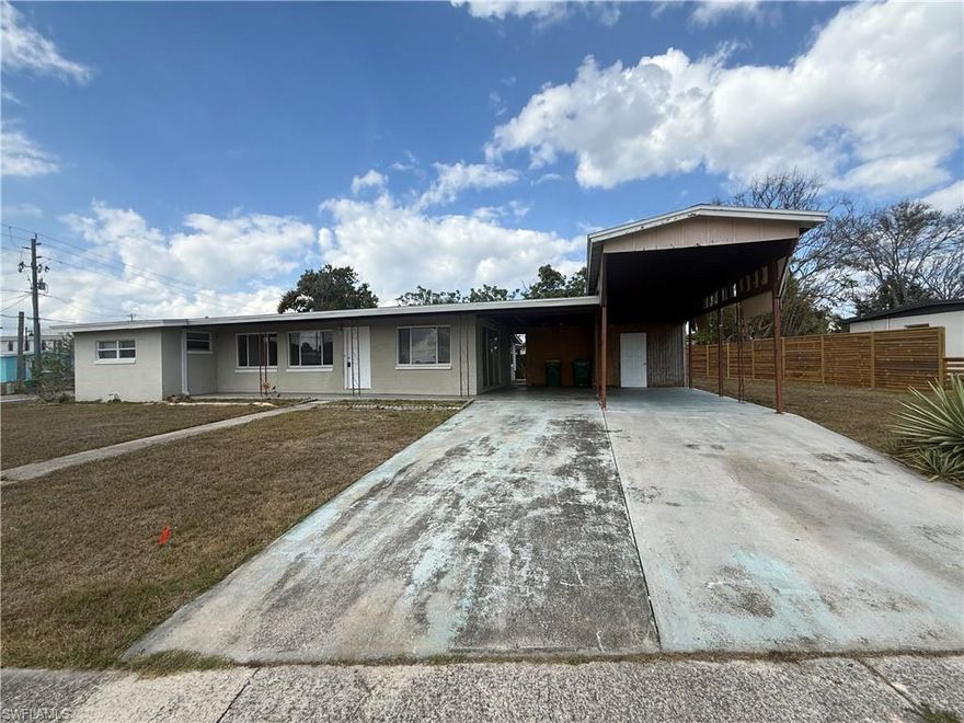 2 bedroom 2 bath home on a corner lot and large covered 2 space carport and storage shed.  Tile floors throughout and enclosed Florida room for extra living area. Conveniently located to the hospital, churches, shopping and schools.