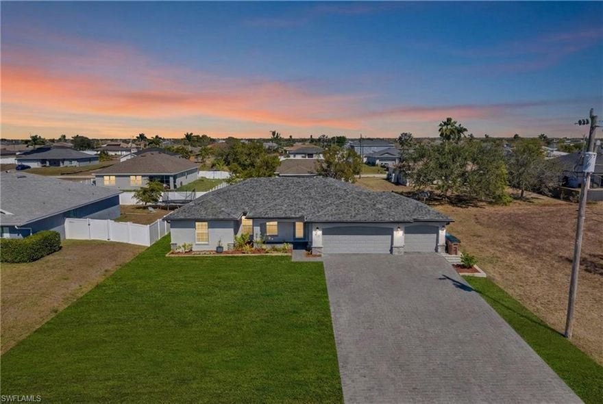 You found your home in the Cape, no damage from Milton, Helene, and Ian while other homes in the Cape can't say the same! Built in 2021, this stunning residence boasts contemporary elegance and modern amenities, offering a perfect blend of comfort and style. With a spacious 1,616 square feet of living space, this home is designed to accommodate your family's needs and provide a fantastic living experience. As you approach, you'll be greeted by the impressive three-car garage, providing ample space for vehicles and storage. Step inside and be captivated by the open floor plan that seamlessly connects the living, dining, and kitchen areas, creating an inviting space for both entertaining and everyday living. The home is updated throughout with tile floors that not only enhance the aesthetic appeal but also ensure easy maintenance. The kitchen features beautiful granite countertops that provide ample workspace for meal preparation including a large island and stainless steel appliances that make cooking a pleasure. The modern cabinetry offers plenty of storage, keeping your kitchen organized and clutter-free. Whether you're hosting a dinner party or enjoying a quiet family meal, this kitchen is equipped to handle it all. The home offers three generously sized bedrooms, each designed with comfort in mind. The master suite is a true retreat, complete with a spacious walk-in closet and an en-suite bathroom. The master bathroom features elegant fixtures and finishes, with a walk in shower and dual vanities. The two additional bedrooms are perfect for family members or guests, offering plenty of space and natural light. The second bathroom is equally well-appointed, ensuring convenience and comfort for everyone in the household. The thoughtful design and attention to detail are evident throughout the home, with modern lighting fixtures and high-quality materials enhancing every room. One of the standout features of this home is the large rear screened porch, an ideal spot for relaxing and enjoying the Florida sunshine while staying protected from the elements. Whether you're sipping your morning coffee or hosting an evening gathering, this outdoor space is perfect for enjoying the beautiful weather year-round. Located in the desirable city of Cape Coral, this home offers easy access to local amenities, shopping, dining, and recreational opportunities. The community is known for its friendly atmosphere and vibrant lifestyle, making it a great place to call home. Every detail in this home has been thoughtfully considered to provide a comfortable and stylish living environment. From the modern finishes to the practical layout, this home is a testament to quality and design. Don't miss the opportunity to make this exquisite property your own and enjoy all that Cape Coral has to offer. Experience the perfect blend of luxury, convenience, and contemporary living in this beautiful home. Discover why this property is the ideal choice for your next move!