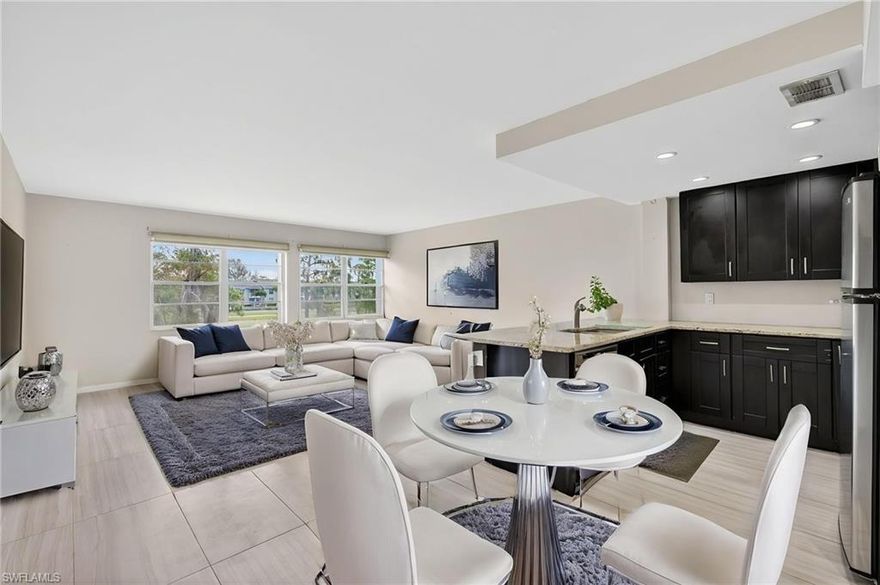 One or more photo(s) has been virtually staged, AI generated or rendered.  Welcome to this beautifully updated one bedroom, one bathroom condo on the second floor of the highly desirable golf resort community of Forest Lake. Rarely available with exceptional rental opportunities. This second floor unit features a brand new kitchen with high end soft close cabinets and stunning granite countertops, along with an updated bathroom. You'll enjoy gorgeous views overlooking the golf course from your private space. Perfect as your primary residence, secondary home, or investment property with strong seasonal or annual rental income potential. The amenities are outstanding—resort style pool just steps away, pickleball, shuffleboard, tennis, and a vibrant clubhouse with ping pong and pool table. Located in a thriving social community with easy access to shopping, fine dining, and Highway 75. Convenient parking and a new elevator add to the appeal. Whether you're seeking a winter escape, extended weekends, or rental income, this gem won't last long at this price. Motivated seller ready to make a deal.