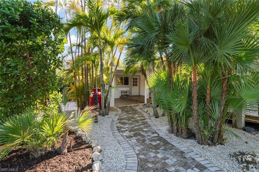 Welcome to Whitehall Road, a hidden treasure and truly unique property on Sanibel Island! This nearly one-acre private oasis is located within the Sanibel Highlands close to world class beaches with easy access to the Sanibel Causeway. The completely remodeled bungalow features a spacious master suite a second guest suite with private living space and expansive outdoor living areas and decks. The grounds are beyond ordinary and draw you to bask in the natural environment and take advantage of the oversized outdoor spaces. This oasis is perfect as is, reimagining a family estate or developing two separate residences. The property includes an additional four lot building site. The total size of both parcels is .94 acres. The bungalow has an attached 2 car garage and an additional detached 2 car garage.