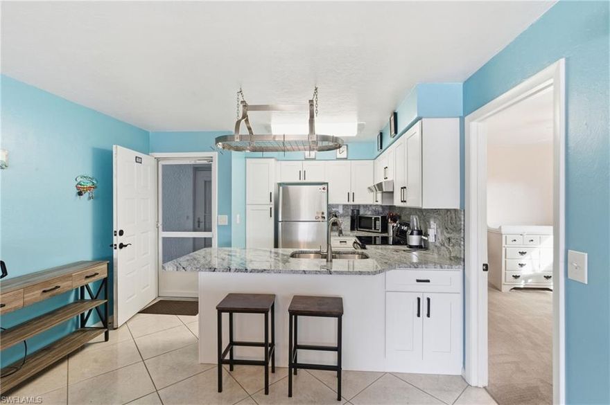 Beautiful 2 bed, 2 bath corner unit condo in the well-maintained, non-age-restrictive Royal Hawaiian Club community in Cape Coral. This end unit features an updated kitchen, screened lanai, and peaceful pond views, offering both privacy and comfort. Located in a great area close to shopping, dining, and everyday conveniences, plus not in a flood zone for added peace of mind. Ideal for full-time living, a seasonal retreat, or an investment opportunity!