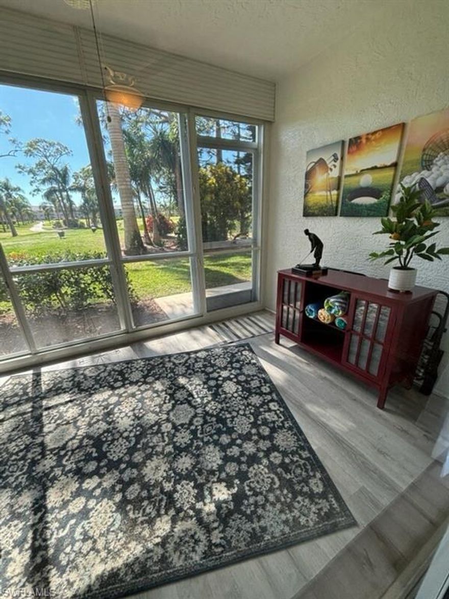 FIRST FLOOR, 2 BED/2 FULL BATH NICELY FURNISHED & TURNKEY CONDO RIGHT ON THE GOLF COURSE & AREA POOL! Everything you need to begin your Florida lifestyle has been done for you! JUST BRING GROCERIES & A SWIMSUIT! The golf course & a community pool are RIGHT IN YOUR BACKYARD! Great Room has FULL-WALL sliding glass doors that open up to your Sunroom & views! Slide open the Plexi-Glass window coverings in your Sunroom to reveal screened-in windows. Let the air in! You have 1 covered carport + locked Storage Room. NEW Electric Golf Cart negotiable. SO many patio areas with BBQ grills throughout the grounds for entertaining. You'll love the numerous regularly scheduled activities such as exercise, bingo & poker. SEE THE MLS SUPPLEMENT SECTION! Community features: bundled 18-hole Executive Golf Course, 8 Har-Tru Lighted Tennis Courts, 5 large Community Pools, Fitness Center, lighted Pickleball, lighted Bocce, lighted Shuffleboard, and lively & lovely neighbors. Quick access to Naples, Bonita Beach, Fort Myers & Fort Myers Beaches & about 15 minutes from RSW Airport, close to shopping (famed Coconut Pointe MegaMall) & dining, spectacular beaches & many parks. Charming & modern. Many upgrades & well-maintained.
