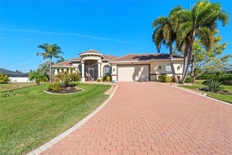This stunning Southwest Cape Coral residence blends grand architectural design with extensive 2023–2024 upgrades, offering over 3,200 sq. ft. of beautifully appointed living space. Featuring 4 bedrooms, 2.5 baths, and a heated pool and spa with an outdoor shower and direct access to a powder room, this home is perfect for luxurious Florida living and entertaining. 

Step inside to discover soaring 26-foot ceilings, alabaster and Austrian crystal chandeliers, and a bright, open layout with a central island kitchen w/cooktop and both a formal dining room and breakfast area overlooking the pool. The lavish primary suite provides a private retreat with a tray ceiling and peaceful exterior view.  The primary bath offers a separate soaking tub and walk-through shower, while two additional bedrooms share a convenient Jack-and-Jill bathroom. 

Recent updates include a new tile roof, an upgraded picture frame screened pool enclosure, and fresh exterior and interior paint (2023), along with a new HVAC system (A/C), new bedroom carpeting, a new water heater, and a GE refrigerator (2024). Enjoy comfort and efficiency with a newer pool pump, hurricane impact windows, accordion hurricane doors for sliders, and a Duromax 13,000-watt whole-house generator. Safety and convenience abound with a new ADP alarm system with cameras, central vacuum, internal pest control, irrigation system, and built-in speakers in three rooms plus the outdoor area. Every room features a ceiling fan, and even the garage and Florida room are air-conditioned for added comfort.

A versatile bonus room off the garage serves perfectly as a home office, gym, or game room. The home’s cul-de-sac location offers peace and privacy on an oversized, beautifully landscaped lot with mature trees and lush plantings. The screened front porch provides a warm, welcoming entry — and best of all, there are no HOA fees!

Home has never flooded - sellers do have a transferrable flood policy at $1604 annually.
