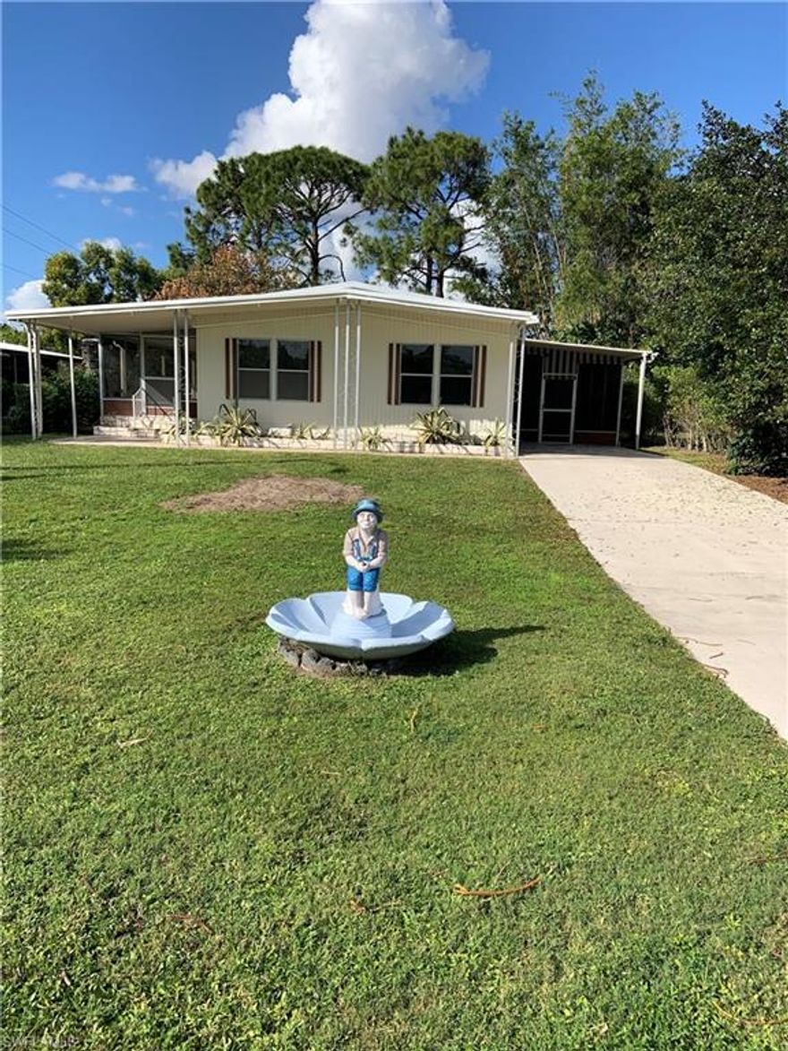 Welcome to paradise in beautiful, sunny SW Florida.  This lovely home has been updated and is move in ready. This 2 bedroom / 2 bath upgraded home features stainless steel appliances, gorgeous quartz countertops, new stone backsplash, brand new AC, extra large great room / living room, open floor plan, kitchen island, new flooring, new paint and the list goes on... This property which is located in one of the best 55 and older communities, pet friendly, land ownership, no HOA fees, is close to restaurants, shopping and gulf beaches,  Club membership, for an extra fee, is voluntary which includes community clubhouse, swimming pool, shuffleboard and also boat/RV parking storage for another fee.