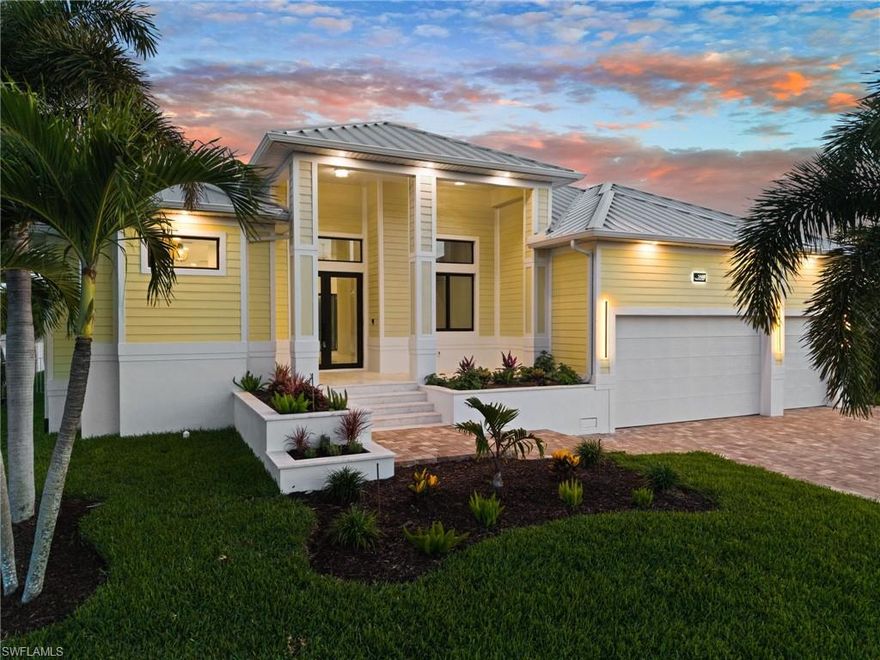 Brand-new waterfront luxury in Cape Coral’s iconic Yacht Club area! This home is thoughtfully designed for buyers who want quality, boating access, privacy, and elevated Florida living. Completed in 2026, this 3-bedroom + private office/flex room, 3-bath home offers 2,416 sq. ft. under air and 3,738 total sq. ft. with soaring 12-foot ceilings, oversized 8-foot white oak doors, limestone flooring throughout, and a stunning open-concept design made for entertaining.

At the heart of the home is a designer kitchen featuring custom white oak cabinetry, Thermador appliances, dual dishwashers, built-in wall oven and microwave, a large center island, deep built-in pantry shelving, and a wine fridge/coffee bar area. 

The owner’s suite delivers a true retreat experience with a spa-inspired bath, freestanding soaking tub, oversized walk-in shower, smart toilet, and custom walk-in closet.

One of the guest bedrooms offers an en suite pool bath for guests and convenience after a day at the pool or returning from a day on the boat.

Step outside to a resort-style pool and spa, expansive sun deck, covered lanai, outdoor kitchen, and mosquito/no-see-um misting system for effortless year-round enjoyment in your oversized corner lot.

Boaters will appreciate the concrete dock ready for your ideal boat lift, quick access to the Caloosahatchee River, and Gulf access with one bridge along the route. The oversized homesite offers the favored Southern rear exposure, open rear canal setting, no immediate neighbor on one side, and a spacious fenced-in lawn area, creating a rare sense of privacy for a waterfront property.

Additional features include impact windows and doors, elevated construction above FEMA requirements, hydrostatic vents in the oversized 3-car garage, UV air and water purification systems, keyless entry, smart LED mirrors, surround sound, security cameras, and designer finishes throughout. Not in an HOA. And if you want, the city of Cape Coral allows weekly STR (short-term rentals).

Minutes to South Cape dining, nightlife, and open-water boating, this home is a rare opportunity to own new construction luxury in one of Cape Coral’s most established waterfront neighborhoods.

Opportunities like this don't show up often; if this is the one for you why wait?