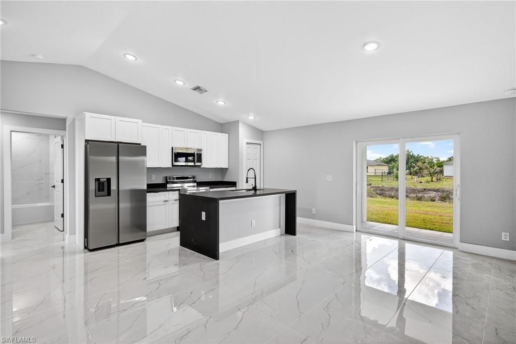 Photo of 702 Carbon ST E, LEHIGH ACRES, FL 33974 (MLS # 226016373)
