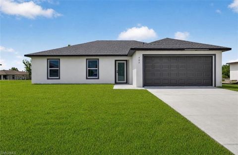 Photo of 702 Carbon ST E, LEHIGH ACRES, FL 33974 (MLS # 226016373)